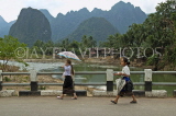 LAOS, Central Highlands, Vang Vieng, Mekong River, children going to school, LAO120JPL