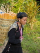 LAOS, Luang Nam Tha, Lanten hill tribe woman, carrying corn basket on back, LAO79JPL