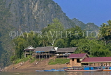 LAOS, Luang Prabang, Mekong Riverside, with boats and houses, LAO102JPL