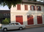 LAOS, Luang Prabang, Mercedes parked out in front of colonial hotel, LAO83JPL