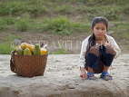 LAOS, Mekong River, girl and Papaya (Paw Paw) fruit basket, Lao, LAO93JPL