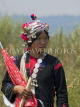 LAOS, Muang Singh, Akha tribe woman out in the fields, LAO49JPL