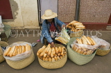 MADAGASCAR, Antisirabe, French Bread vendor, MDG214JPL