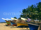 MALAYSIA, Kota Bharu, fishing boats lined up along beach, MSA403JPL
