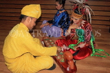 MALAYSIA, Kuala Lumpur, cultural show, people in traditional dress, playing Congkak, MSA775JPL