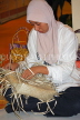 MALAYSIA, traditional crafts, Pandanus leaf weaving, worker weaving bag, MSA609JPL