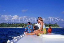 MALDIVE ISLANDS, Biyadhoo Island, tourist with locals on boat trip, MAL73JPL