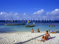 MALDIVE ISLANDS, Embudhu Village island, beach, sunbathers, boats and divers, MAL468JPL