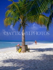 MALDIVE ISLANDS, Kuredu Island, beach with deck chairs and coconut tree, MAL617JPL