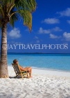 MALDIVE ISLANDS, Kuredu Island, beach with holidaymaker on deck chair, MAL631JPL