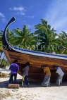 MALDIVE ISLANDS, Maafushi, local fishing island village, dhoni (fishing boat) being repaired, MAL109JPL