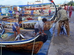 MALDIVE ISLANDS, Male, fishermen unloading Tuna from dhoni (fishing boat), MAL710JPL