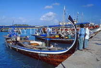 MALDIVE ISLANDS, Male, harbour, Dhonis (fishing boats) lined up by waterfront, MAL49JPL