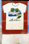 MALDIVE ISLANDS, Male, shop front with T Shirt mural, MAL777JPL