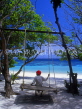 MALDIVE ISLANDS, Vadhoo Island, boy on swing, MAL486JPL