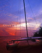 MALDIVE ISLANDS, Velassaru Island, dusk, catamaran sailboat on beach, MAL527JPL