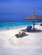MALDIVE ISLANDS, Velassaru Island, sunbather and sunshade, MAL441JPL