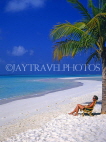 MALDIVE ISLANDS, beach with coconut tree, sunbather on chair, MAL615JPL