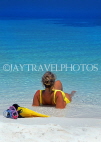 MALDIVE ISLANDS, seascape, with sunbather on beach, MAL741JPLJPL