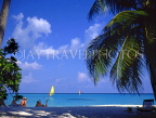 MALDIVE ISLANDS, tourists on beach and windsurfers, MAL695JPL