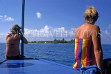 MALDIVE ISLANDS, tourists on excursion, by Dhoni (fishing boat), MAL688JPL