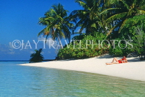 MALDIVE ISLANDS, typical island, beach scene and sunbather, MAL775JPL