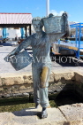 MALTA, Marsaxlokk, fishing village, fisherman with baskets of fish sculpture, MLT1128JPL