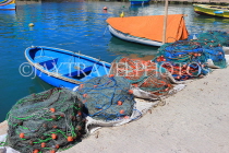 MALTA, Marsaxlokk, fishing village, harbourfront small boats and fish nets, MLT1052JPL