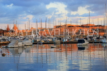 MALTA, Sliema, seafront, sunset and boats, view towards Valletta, MLT825JPL