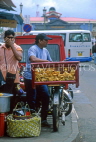 MAURITIUS, Port Louis, main market, snacks seller with bicycle, MRU295JPL