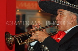 MEXICO, Mexico City, Mariachi playing trumpet, MEX657JPL