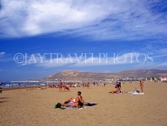 MOROCCO, Agadir, beach and tourists sunbathing, MOR282JPL