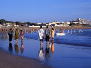 MOROCCO, Agadir Beach, people paddling, MOR291JPL