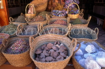 MOROCCO, Marrakesh, Medina, souk, spices and herbs in basket, MOR118JPL