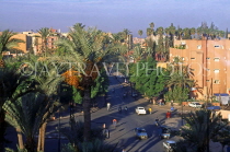 MOROCCO, Marrakesh, New Town street scene and palm trees, MOR170JPL