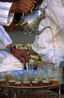MOROCCO, Rabat, typical Tea ceremony, pouring tea into glasses, MOR444JPL