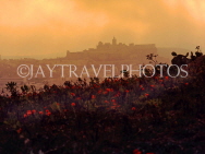 Malta, GOZO, dusk landscape and Citadel in background, MLT497PL