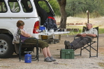 NAMIBIA, Waterberg National Park, campers napping, NAM174JPL