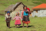 PERU, Chupani, Andean Mountain scenery, Peruvian children walking along, PER85JPL