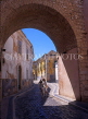 PORTUGAL, Algarve, FARO, Old Town street and archway, POR406JPL