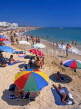 PORTUGAL, Algarve, QUARTEIRA, beach, holidaymakers and parasols, POR424JPL