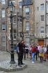 SCOTLAND, Edinburgh, visitors on free walking tour with guide, SCO952JPL