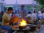 SINGAPORE, Hawker Centre, vendor cooking Sate, SIN242JPL