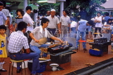 SINGAPORE, Hawker Centre, vendors cooking Sate, SIN293JPL