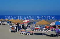 SPAIN, Andalucia, FUENGIROLA, beach, sunbathers and sunshades, SPN295JPL