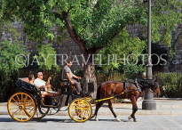 SPAIN, Andalucia, SEVILLE, tourists on horse & carriage ride, SPN1478JPL