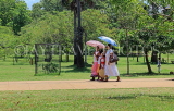SRI LANKA, Anuradhapura, pilgrims visiting ancient city, SLK5520JPL