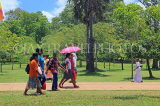 SRI LANKA, Anuradhapura, pilgrims visiting ancient city, SLK5521JPL