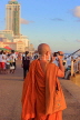 SRI LANKA, Colombo, Galle Face Green, Buddhist monk taking photos, SLK5246JPL