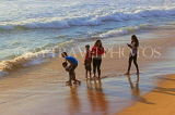 SRI LANKA, Colombo, Galle Face Green, people enjoying paddling on the beach, SLK5251JPL